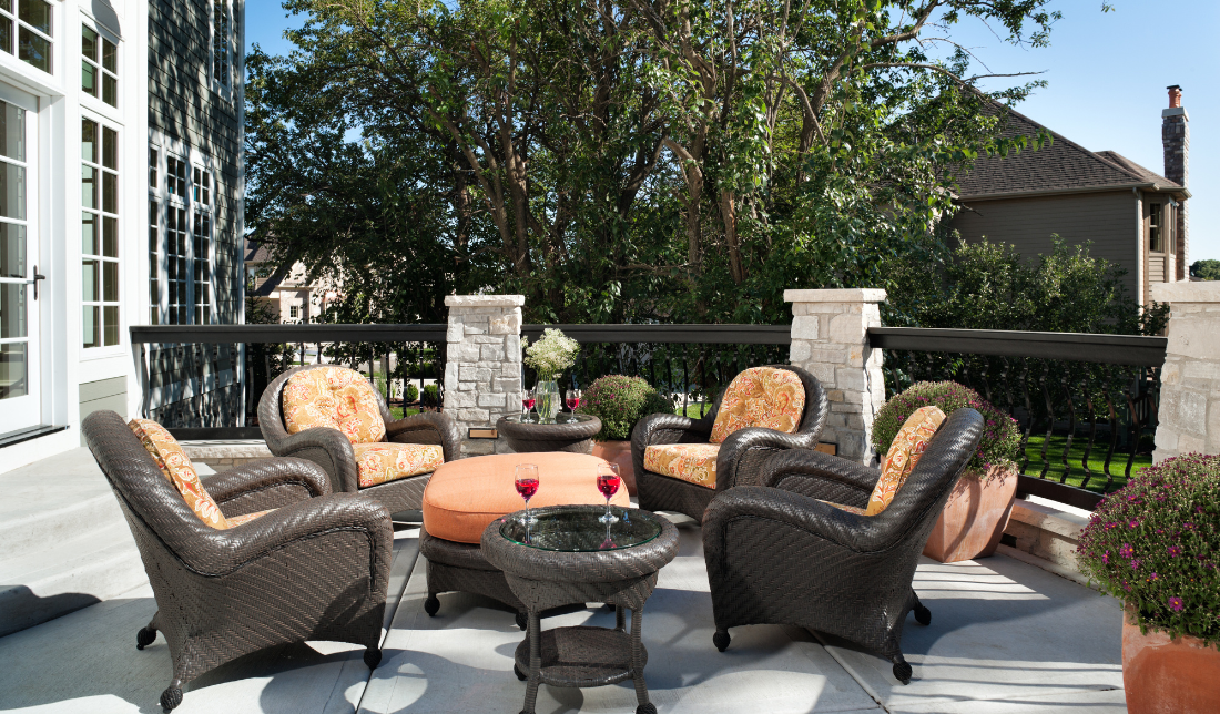 beautifully furnished outdoor patio with high-quality furniture