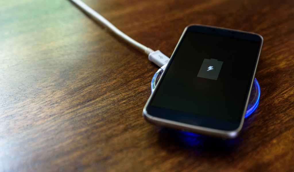 Magnetic charging cable with a smartphone