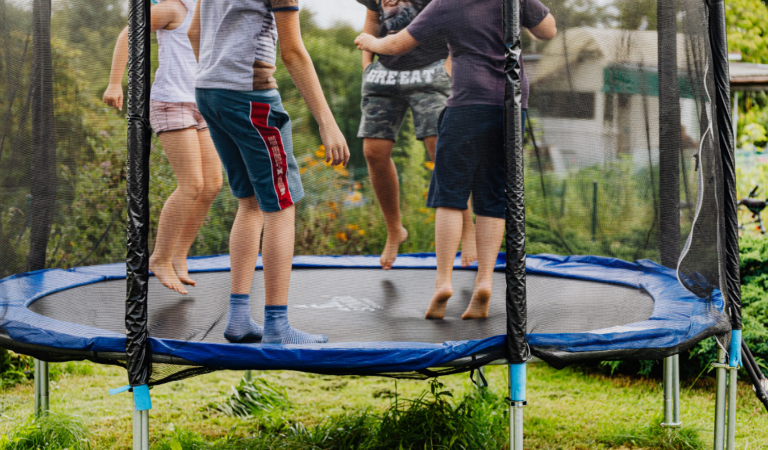 backyard with a fun trampoline