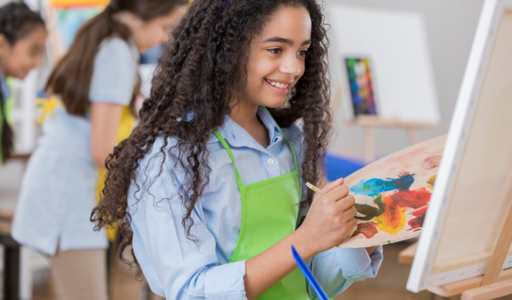 classroom or an art studio with students or artists