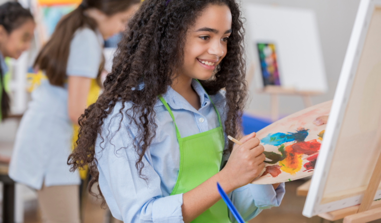 classroom or an art studio with students or artists