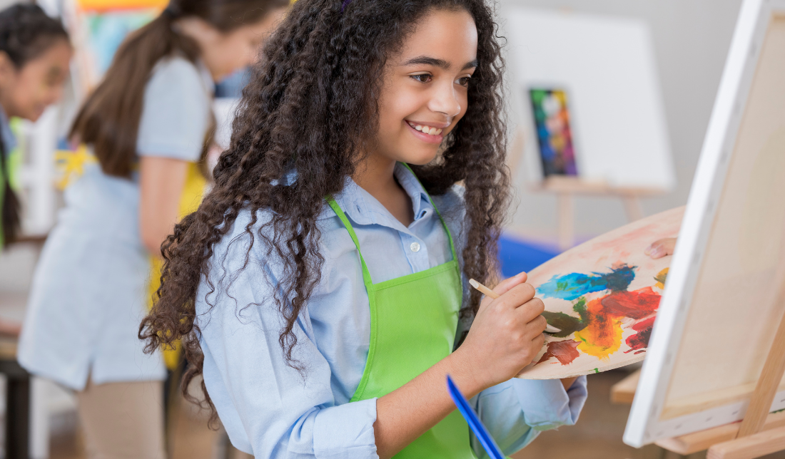 classroom or an art studio with students or artists