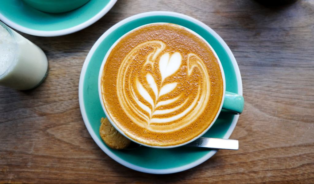 close-up of a perfectly brewed espresso with a beautiful latte art design