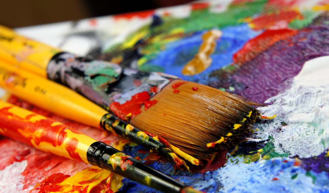 colorful palette of art supplies vibrant pigments and glitters