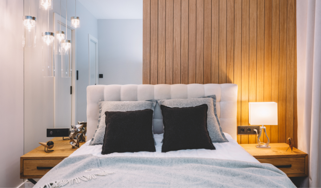 cozy, well-made bed with luxurious bedding