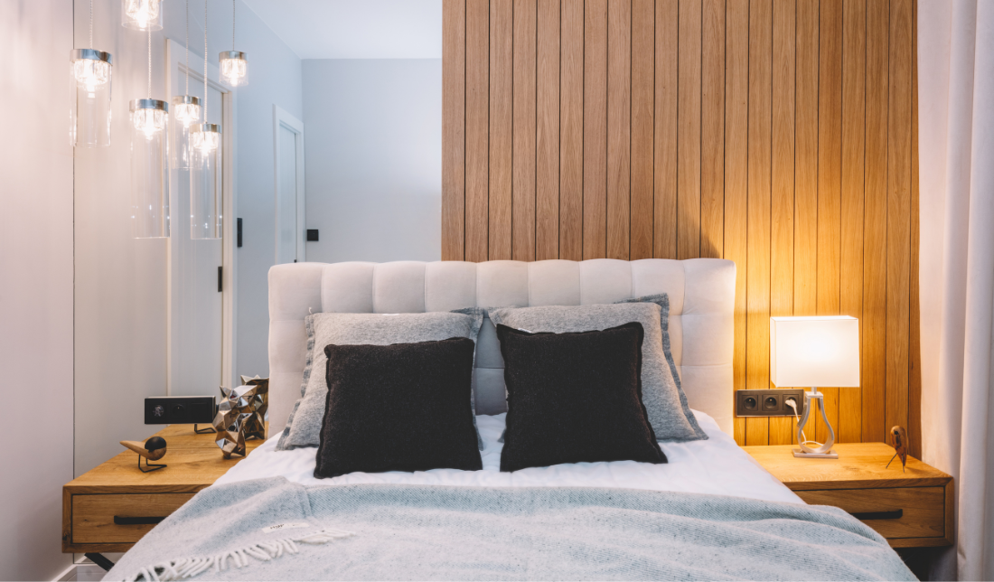 cozy, well-made bed with luxurious bedding