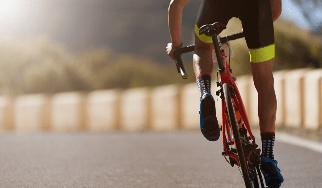 cyclist in action wearing headphones