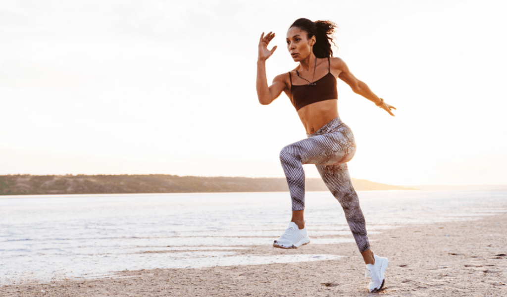 fitness conscious woman running on the beach