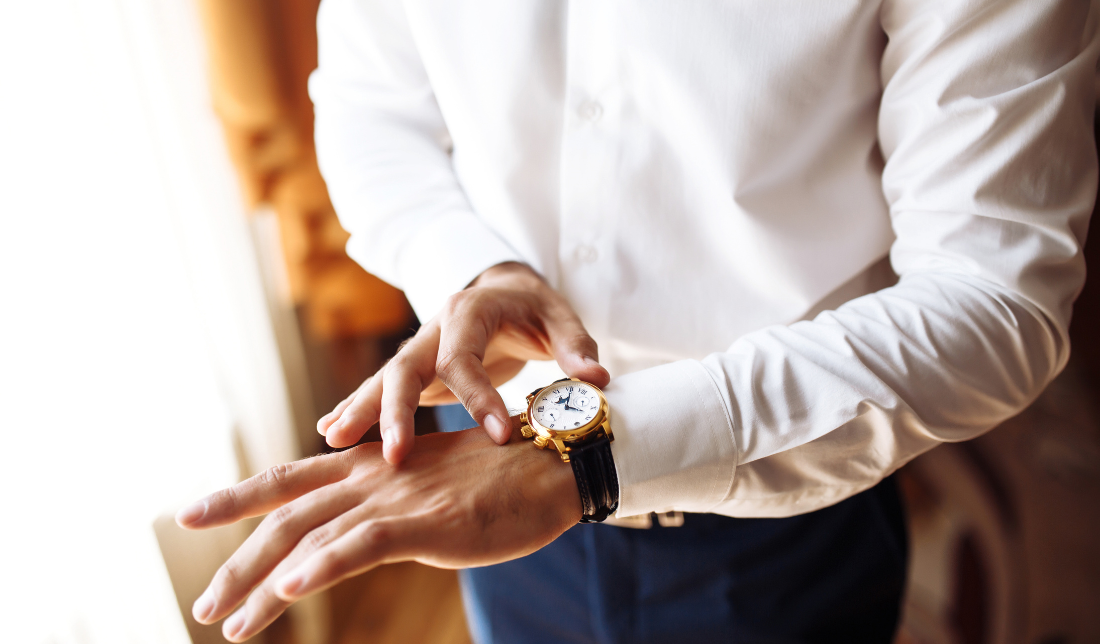 luxury men's watch on a suit cuff