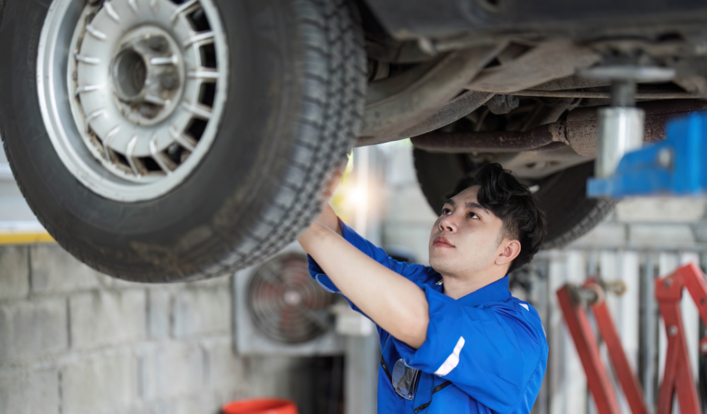 mechanic working on a vehicle