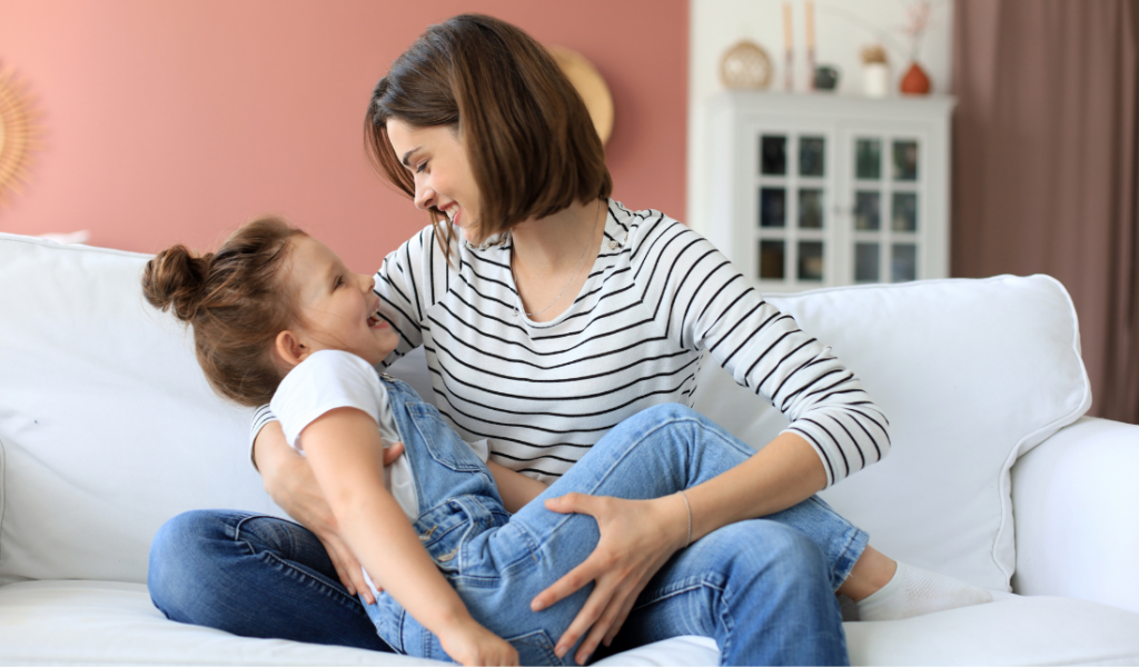 minimalist clothing showcased on a mother with her children