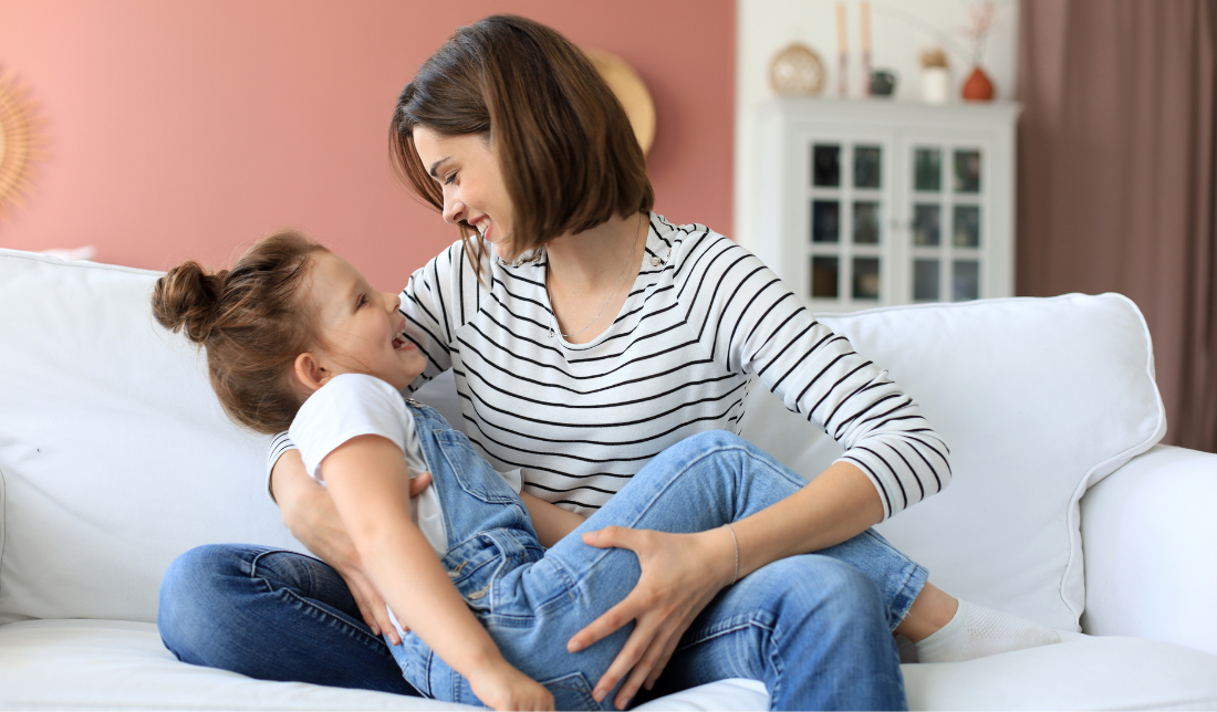 minimalist clothing showcased on a mother with her children