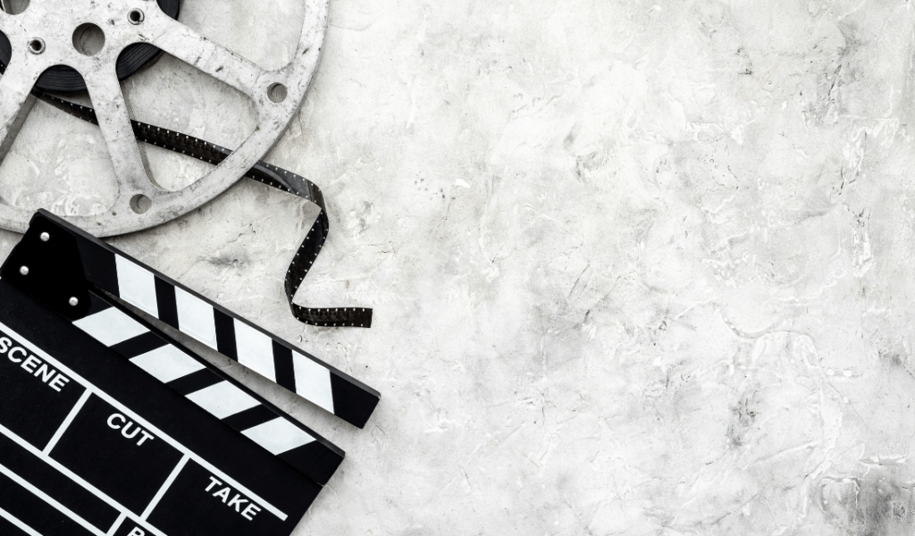 movie reel with religious symbols overlaid