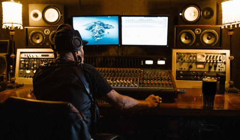 musician or artist using branded headphones