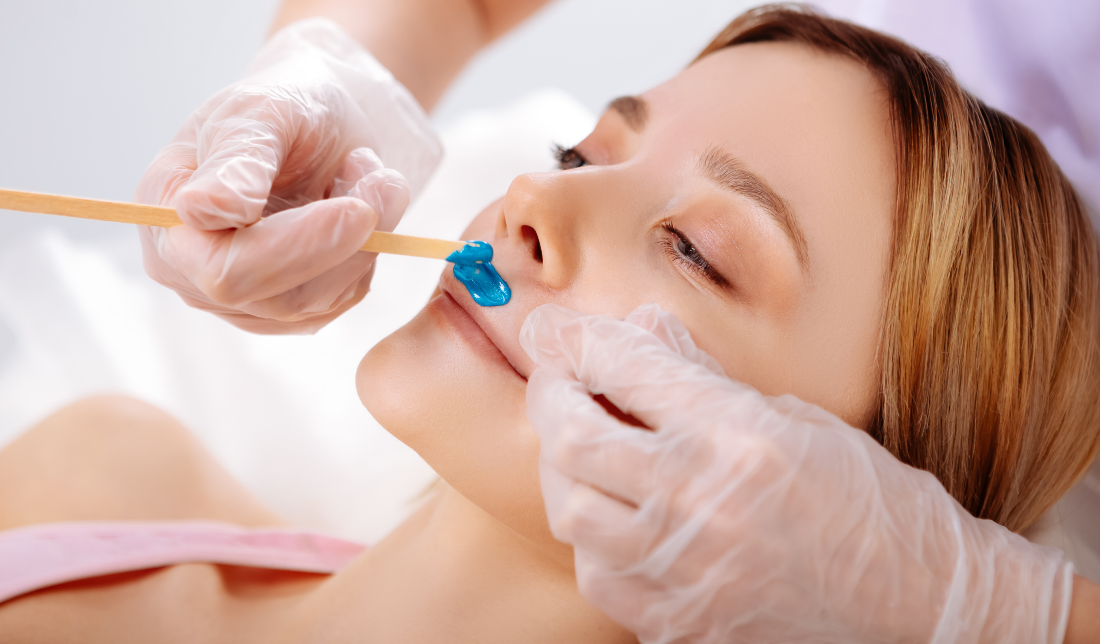 person waxing their nose using the nose waxing kit