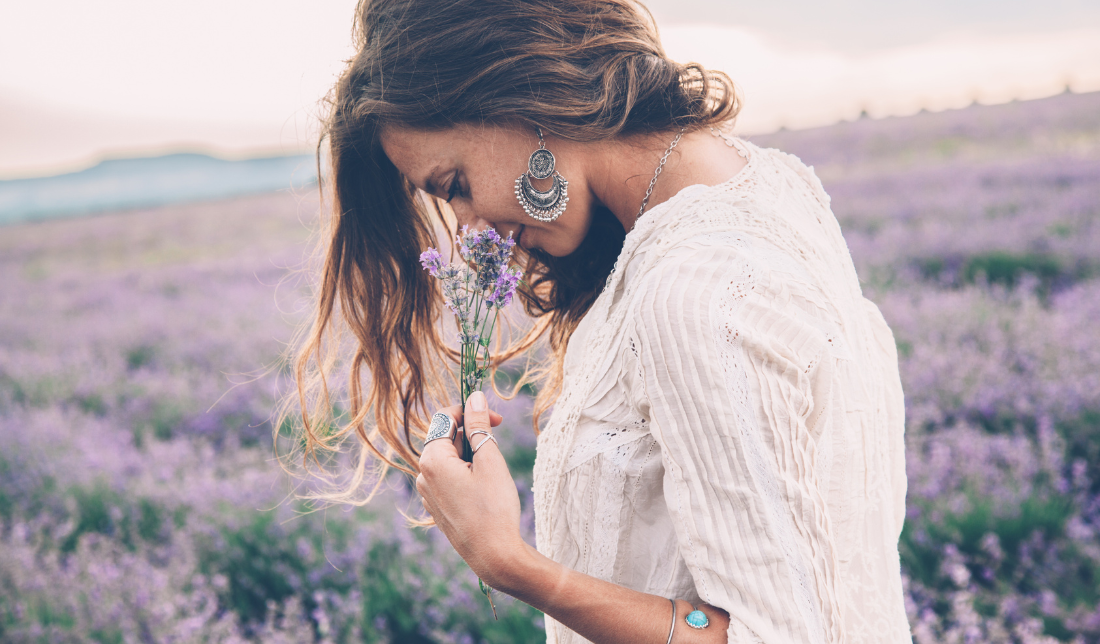 person wearing bohemian-inspired accessories