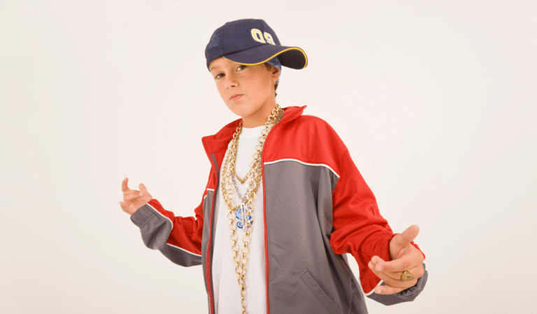 piece of hip hop-inspired jewelry on a person's finger or neck