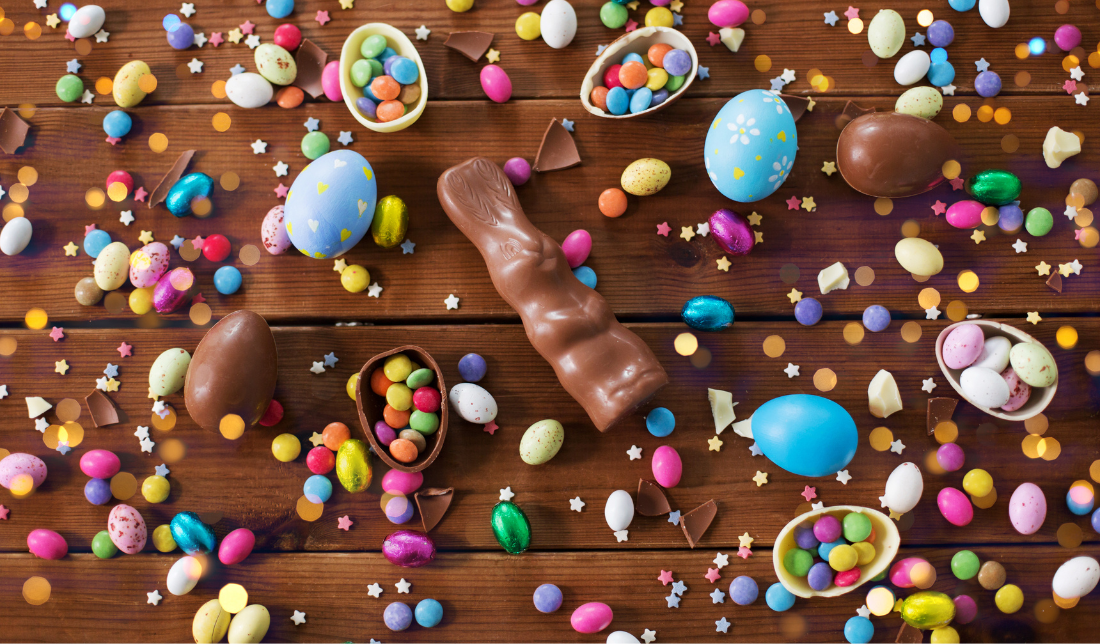 several candy and chocolate arranged in colorful display