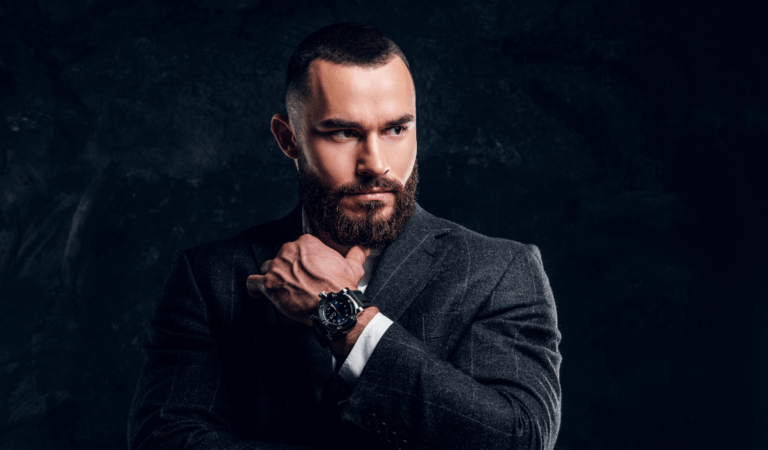 stylish man wearing one of the fashionable watches