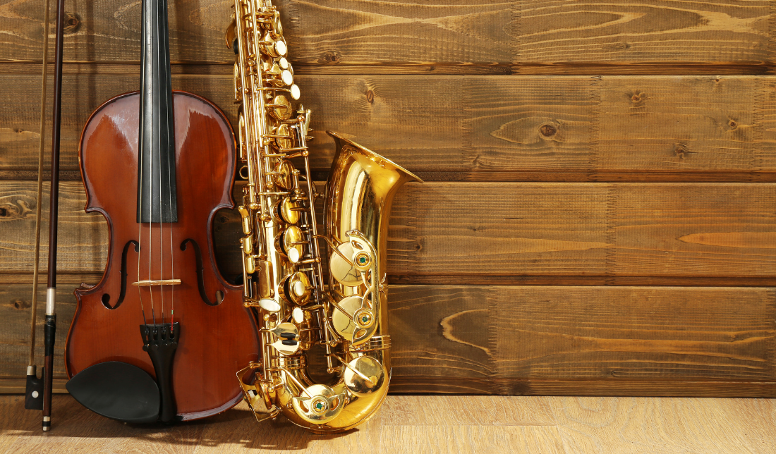 violin and saxophone on a white background