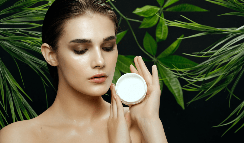 woman holding a botanical wellness product