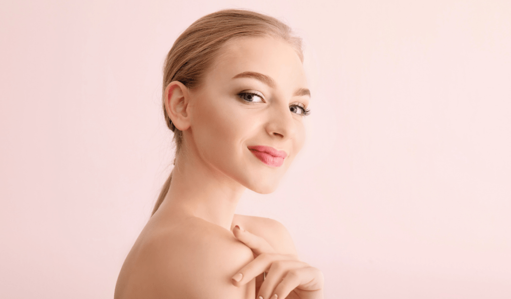 woman with clear and glowing skin, radiating good health and vibrancy