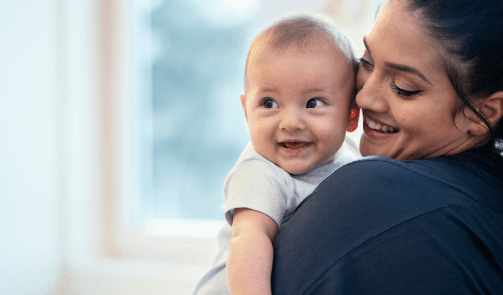 parent holding a baby