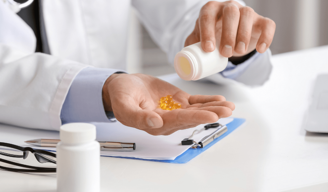 person taking a pill or supplement